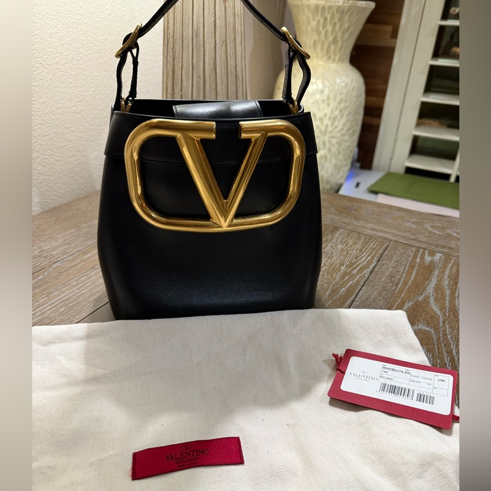 Valentino Black bucket style crossbody Bag with Gold Logo!!!